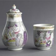 A CHINESE EXPORT PEAR-SHAPED MILK JUG, A COVER AND A COFFEE CUP
CIRCA 1740
