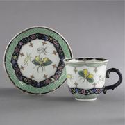 A CHINESE EXPORT COFFEE CUP AND SAUCER
CIRCA 1740
