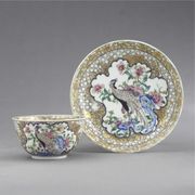 A CHINESE EXPORT FAMILLE-ROSE EGGSHELL TEABOWL AND SAUCER
CIRCA 1730
