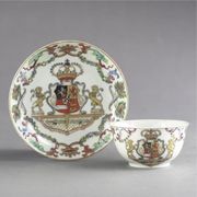 A CHINESE EXPORT ROYAL ARMORIAL TEABOWL AND SAUCER
CIRCA 1747
