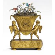 A DIRECTOIRE ORMOLU, T?LE AND PORCELAIN-MOUNTED MANTEL CLOCK