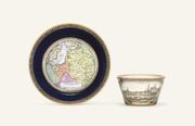 A MEISSEN DOCUMENTARY TOPOGRAPHICAL BLUE-GROUND CABINET-CUP AND SAUCER